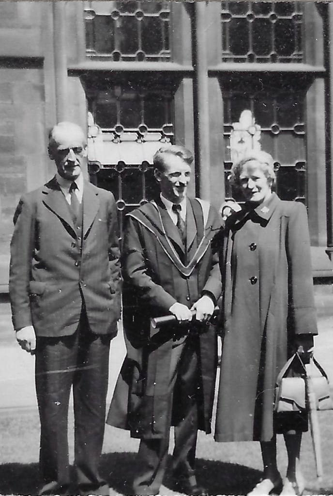 Dad at his graduation with his parents